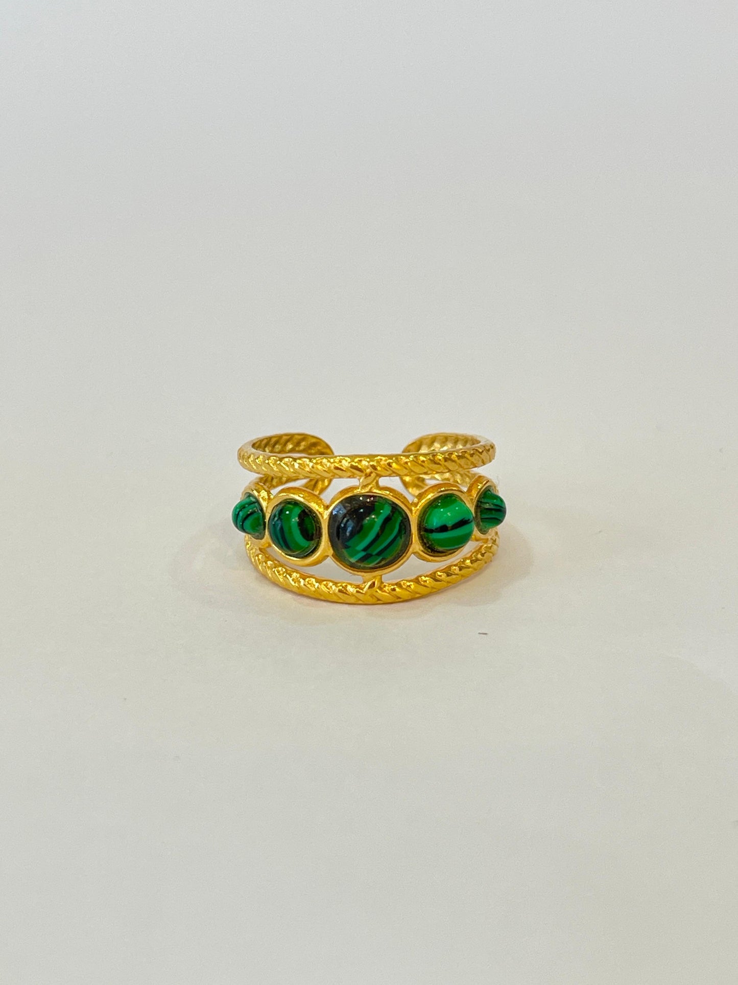 Anillo piedras verde botella