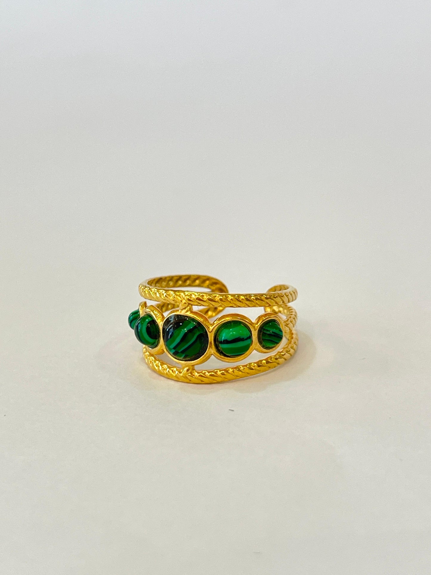 Anillo piedras verde botella